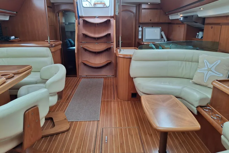 Slide: The Image of Luxurious interior of 2009 Jeanneau Sun Odyssey 54 DS yacht with wooden furnishings. - 11
