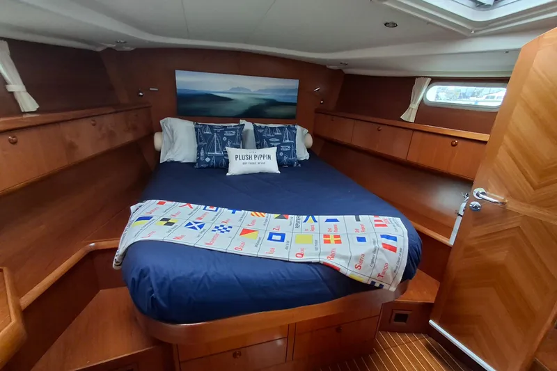 Slide: The Image of Luxurious cabin interior of 2009 Jeanneau Sun Odyssey 54 DS yacht with cozy bedding. - 14
