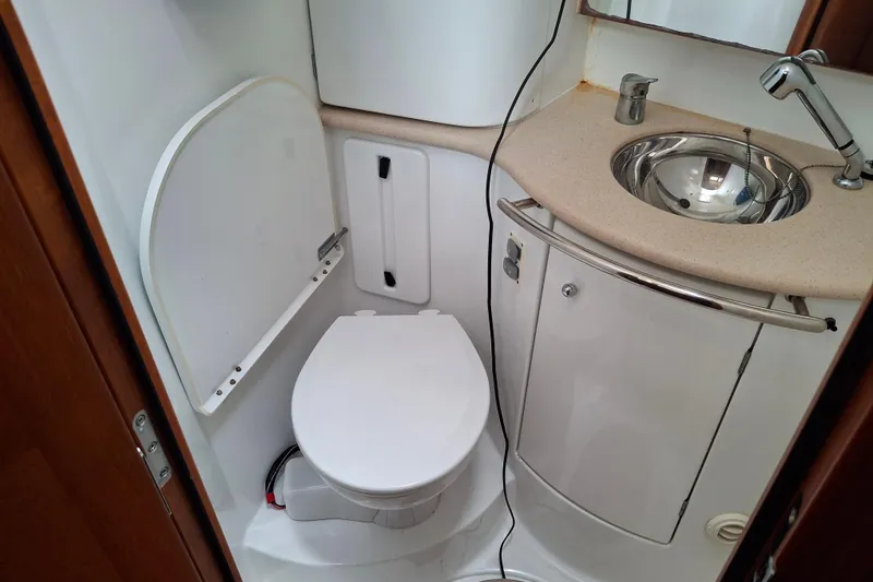 Slide: The Image of Luxurious interior of 2009 Jeanneau Sun Odyssey 54 DS yacht with elegant wood finish. - 21