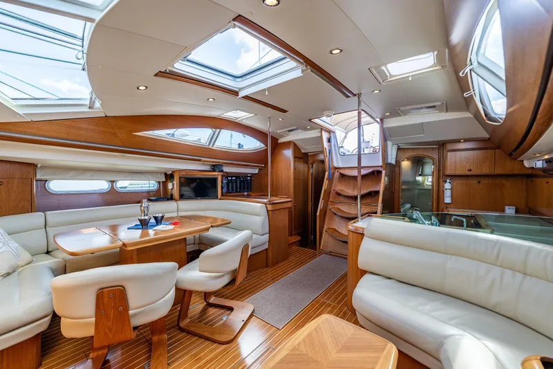 Slide: The Image of Luxurious wooden interior of 2009 Jeanneau Sun Odyssey 54 DS yacht cabin. - 28