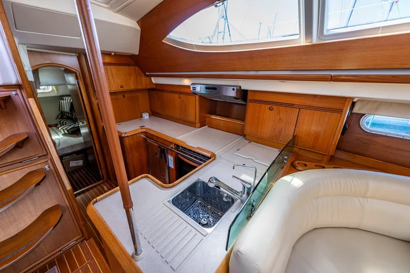 Slide: The Image of Luxurious interior of 2009 Jeanneau Sun Odyssey 54 DS yacht with elegant wood finish. - 30
