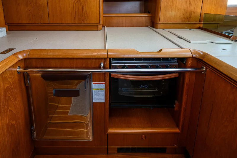 Slide: The Image of Luxurious wooden interior of 2009 Jeanneau Sun Odyssey 54 DS yacht cabin. - 33
