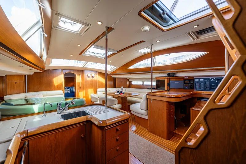 Slide: The Image of Luxurious cabin interior of 2009 Jeanneau Sun Odyssey 54 DS yacht with wooden finish. - 38