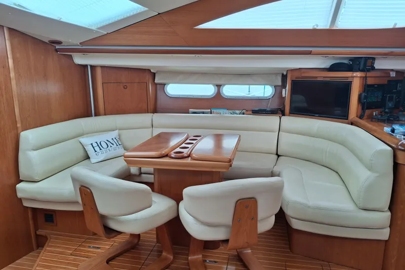 Slide: The Image of Deck of 2009 Jeanneau Sun Odyssey 54 DS sailboat at marina. - 8