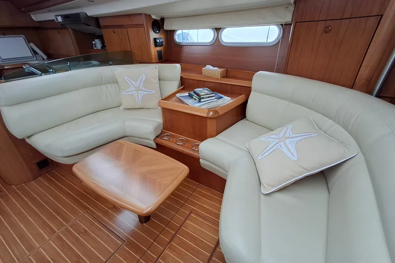 Slide: The Image of Luxurious interior of 2009 Jeanneau Sun Odyssey 54 DS yacht with elegant seating. - 9