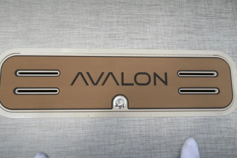 Slide: The Image of Avalon Excalibur LTD Quad Lounger 2026 floor panel with logo. - 24