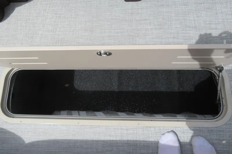 Slide: The Image of Avalon Excalibur 2026 storage compartment with open hatch. - 29