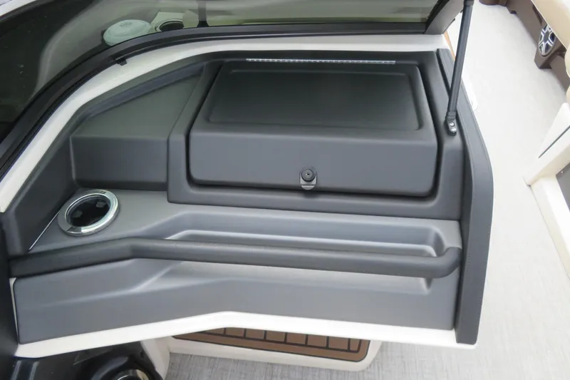 Slide: The Image of 2026 Avalon Excalibur LTD boat dashboard with cup holder. - 34