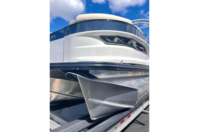 Slide: The Image of 2026 Avalon Excalibur LTD Quad Lounger boat, close-up of the bow. - 9