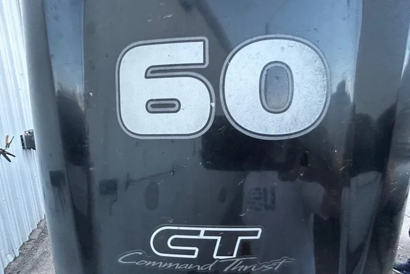 Slide: The Image of Dashboard of 2019 Sun Tracker Party Barge 18 DLX with fuel and RPM gauges. - 26