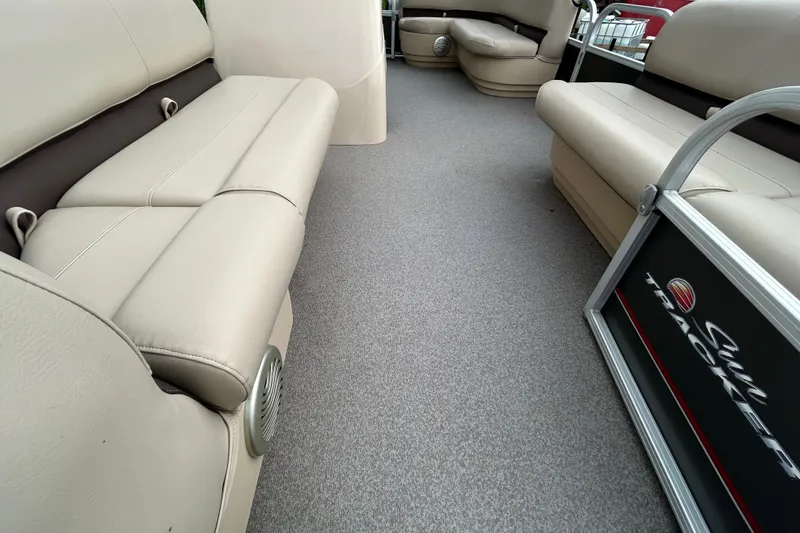 Slide: The Image of Beige leather seating with cup holders on a 2019 Sun Tracker Party Barge 18 DLX. - 31