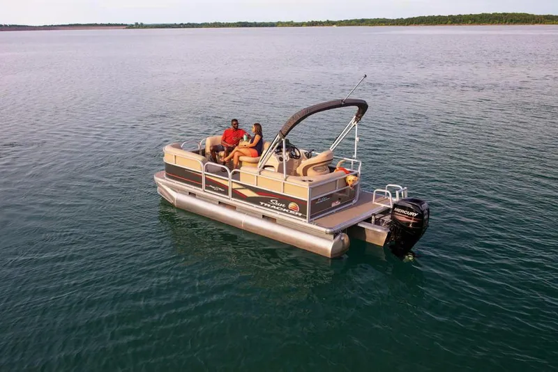 Slide: The Image of 2019 Sun Tracker Party Barge 18 DLX on trailer, featuring Mercury outboard motor. - 8