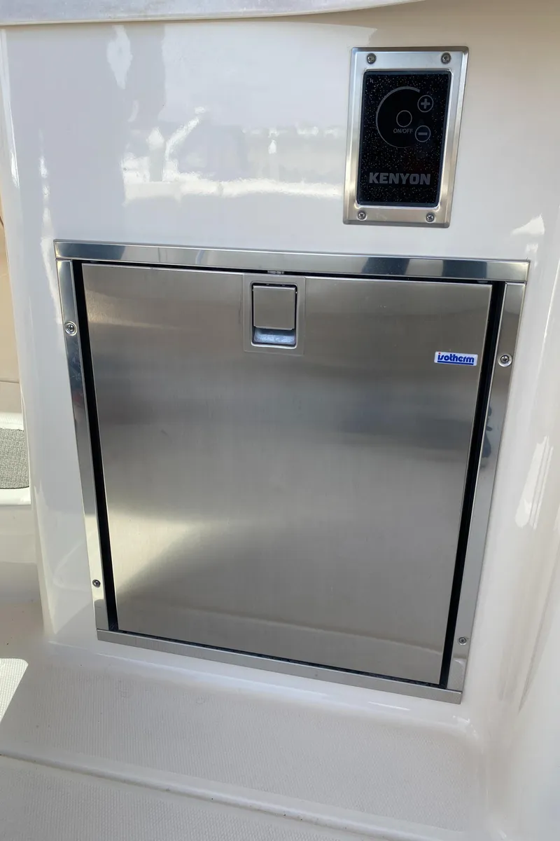 Slide: The Image of Stainless steel appliance on 2017 Grady-White Freedom 375 boat, featuring Kenyon control panel. - 22