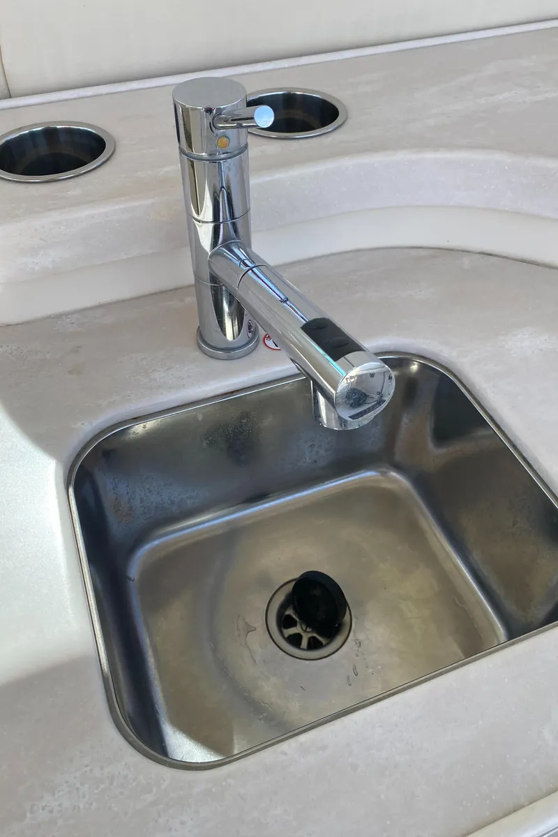 Slide: The Image of Stainless steel sink with modern faucet on 2017 Grady-White Freedom 375 boat. - 25