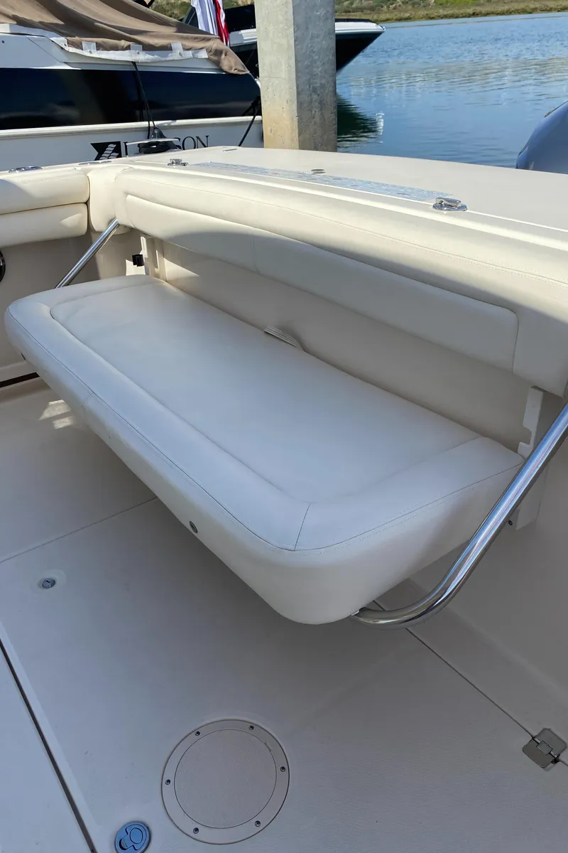 Slide: The Image of 2017 Grady-White Freedom 375 boat with white cushioned seating. - 30