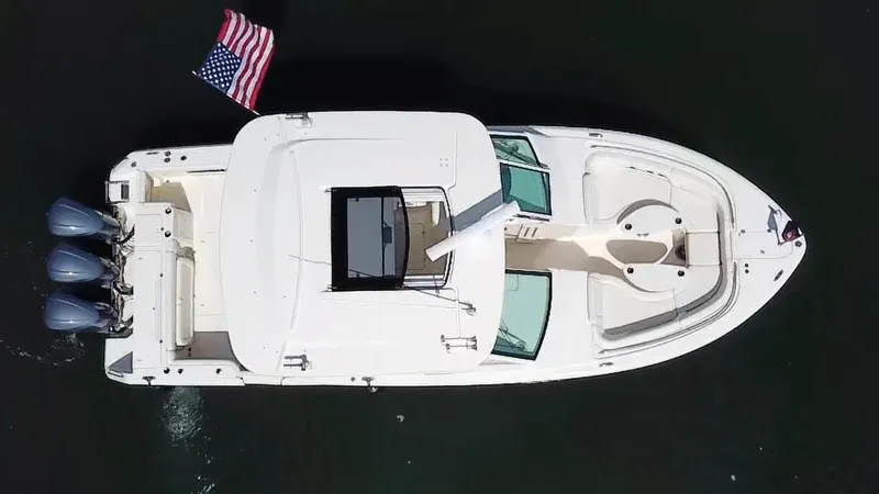 Slide: The Image of Aerial view of 2017 Grady-White Freedom 375 boat with American flag. - 6