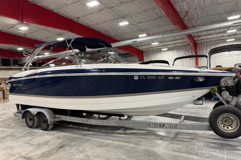 The Image of 2007 Cobalt 282 boat on trailer in indoor storage facility. - 1