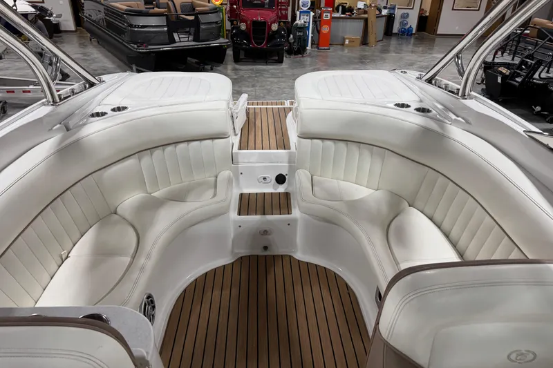 Slide: The Image of 2007 Cobalt 282 boat interior with white seating and teak flooring. - 10