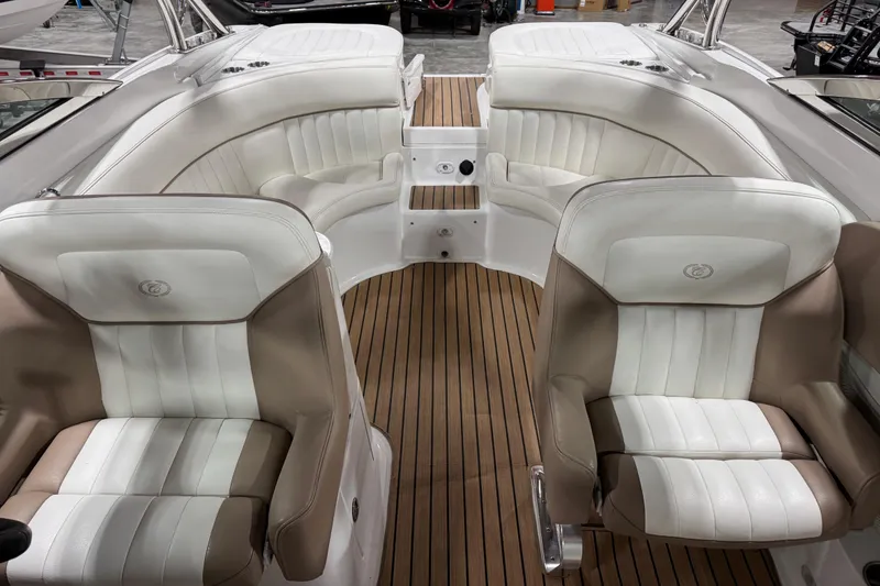 Slide: The Image of Interior of a 2007 Cobalt 282 boat with white and beige seating. - 11