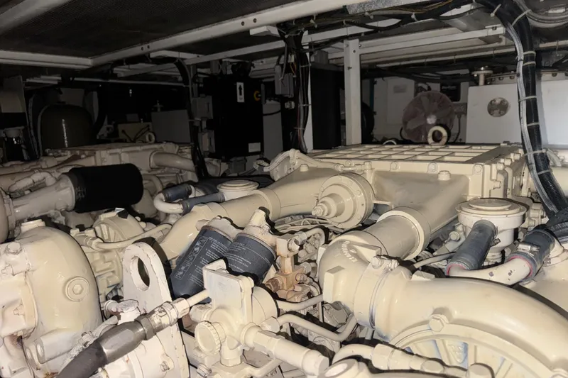 Slide: The Image of Engine room of 2003 Custom Sea Star Pilot House, showcasing complex machinery and components. - 28