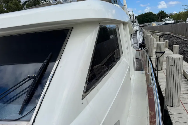 Slide: The Image of 2003 Custom Sea Star Pilot House yacht docked at marina, side view. - 8