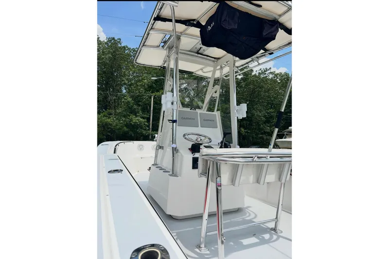 Slide: The Image of 1998 Contender 21 Open boat with Garmin electronics and T-top, viewed from the deck. - 5