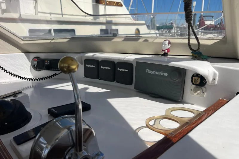 Slide: The Image of Control panel of a 1986 Amel Mango yacht with Raymarine equipment. - 20