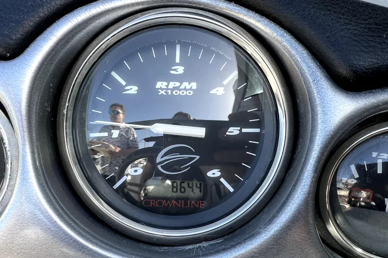 Slide: The Image of Close-up of 2004 Crownline 250 CR tachometer showing 864.4 hours. - 21