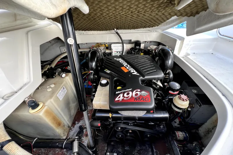 Slide: The Image of 2004 Crownline 250 CR boat engine compartment with MerCruiser 496 MAG engine. - 53
