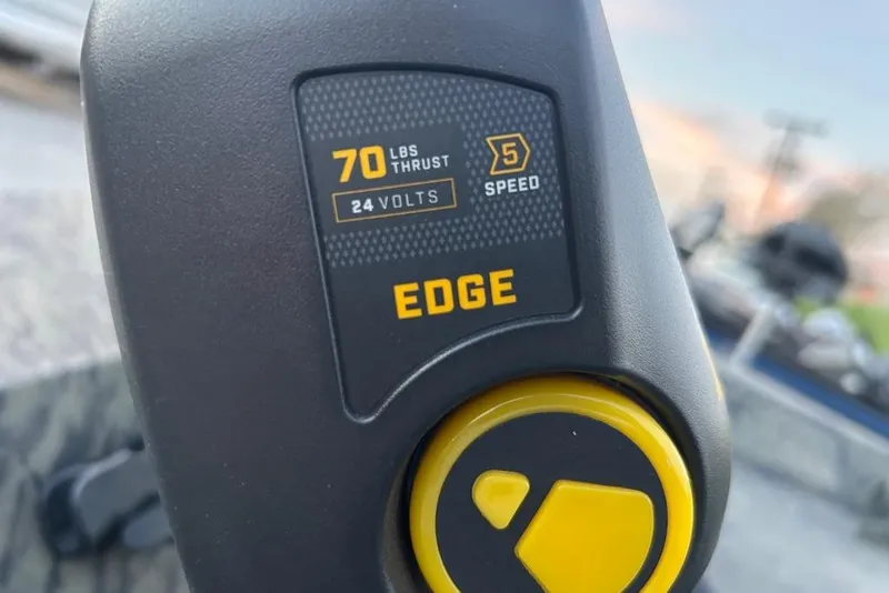 Slide: The Image of Trolling motor control on 2025 Tracker Grizzly 1860 MVX CC boat, featuring Minn Kota Edge. - 14