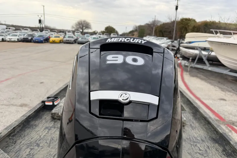 Slide: The Image of 2025 Tracker Grizzly 1860 MVX CC boat interior with camouflage pattern and seating. - 37