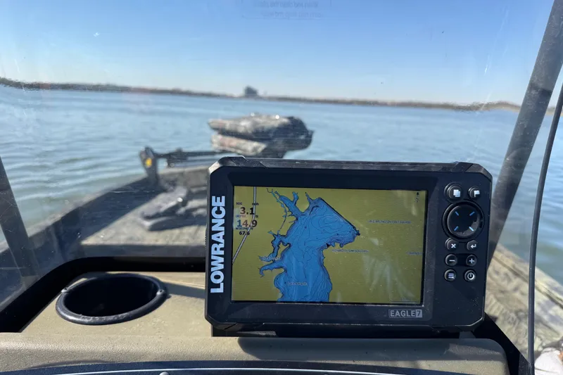 Slide: The Image of Lowrance fish finder on 2025 Tracker Grizzly 1860 MVX CC boat, displaying lake map. - 64