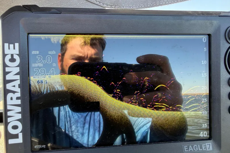 Slide: The Image of Lowrance fish finder display on Tracker Grizzly 1860 MVX CC, 2025 model, showing depth and water temperature. - 68