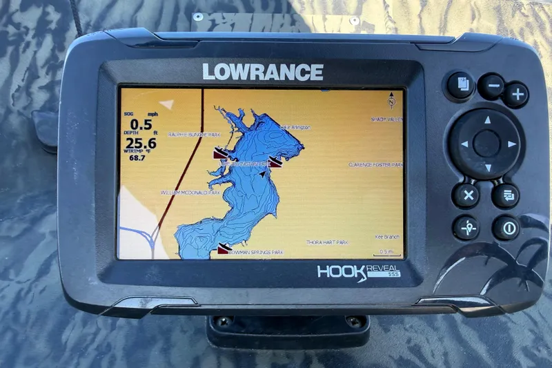 Slide: The Image of Lowrance Hook Reveal GPS on 2025 Tracker Grizzly 1860 MVX CC boat, displaying lake map. - 72