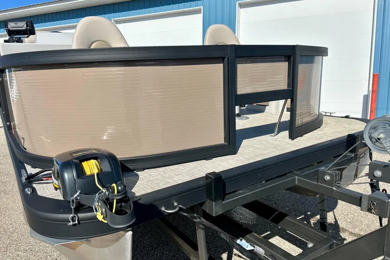 Slide: The Image of 2023 Flagship 200 Lounge Lounger boat on trailer, featuring modern design and equipment. - 15