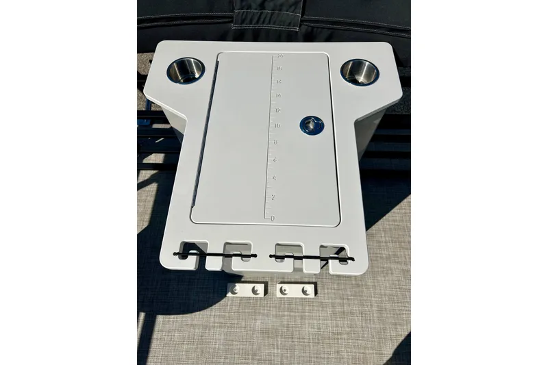 Slide: The Image of 2023 Flagship 200 Lounge Lounger table with cup holders and measurement markings. - 24