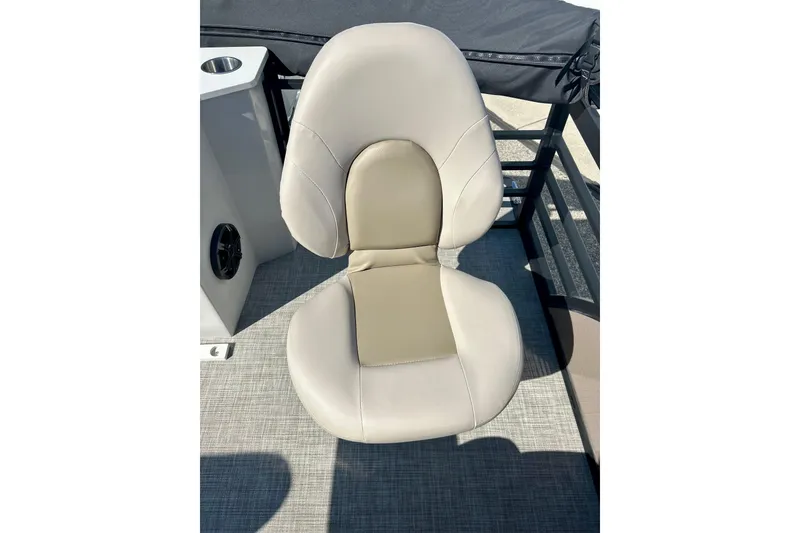 Slide: The Image of Luxurious 2023 Flagship 200 Lounge Lounger seat with beige upholstery on a boat deck. - 26