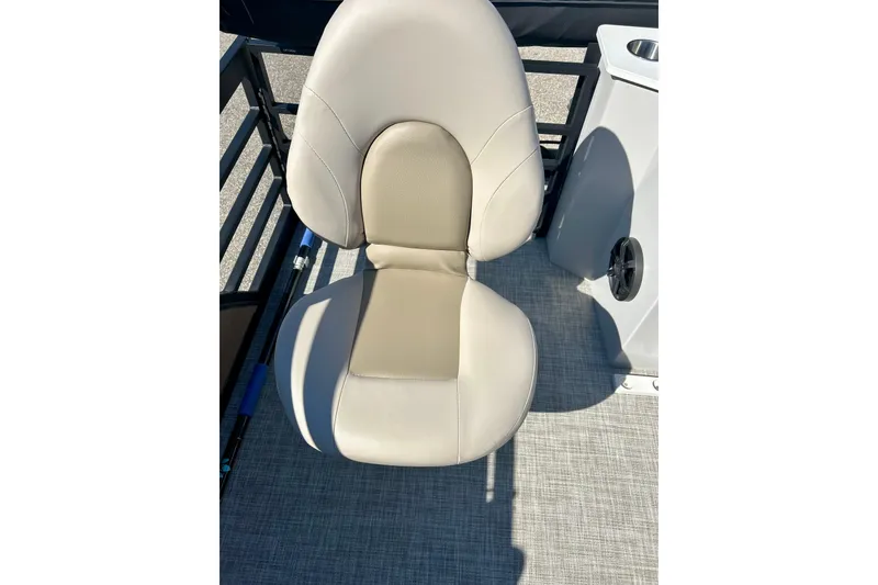 Slide: The Image of 2023 Flagship 200 Lounge Lounger seat with beige upholstery on a boat deck. - 28