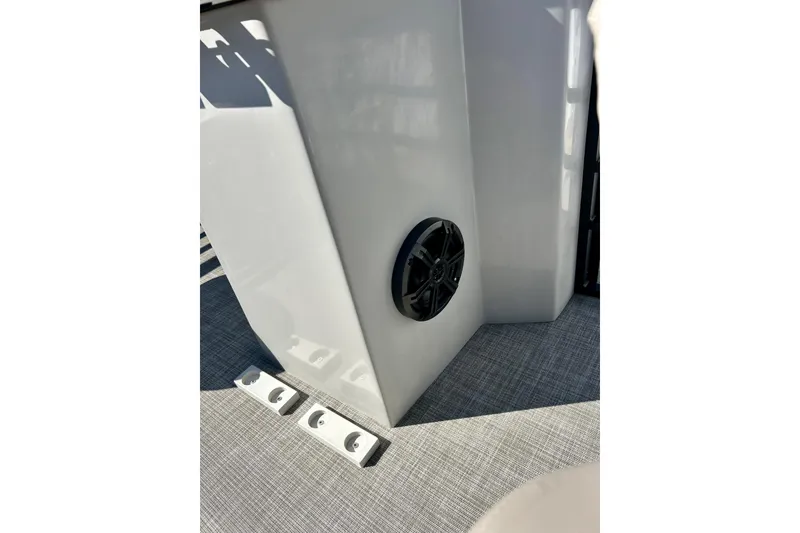 Slide: The Image of Speaker and flooring detail on 2023 Flagship 200 Lounge Lounger boat. - 40