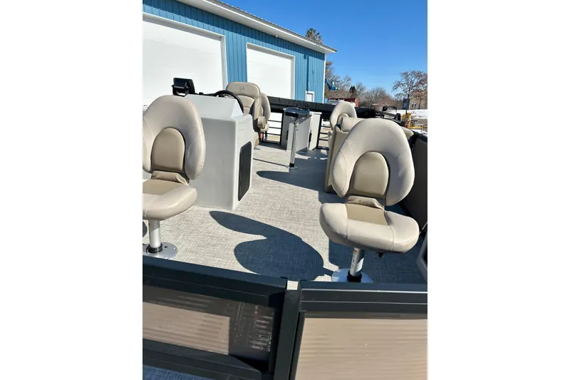 Slide: The Image of 2023 Flagship 200 Lounge Lounger boat with beige seating and modern design. - 43