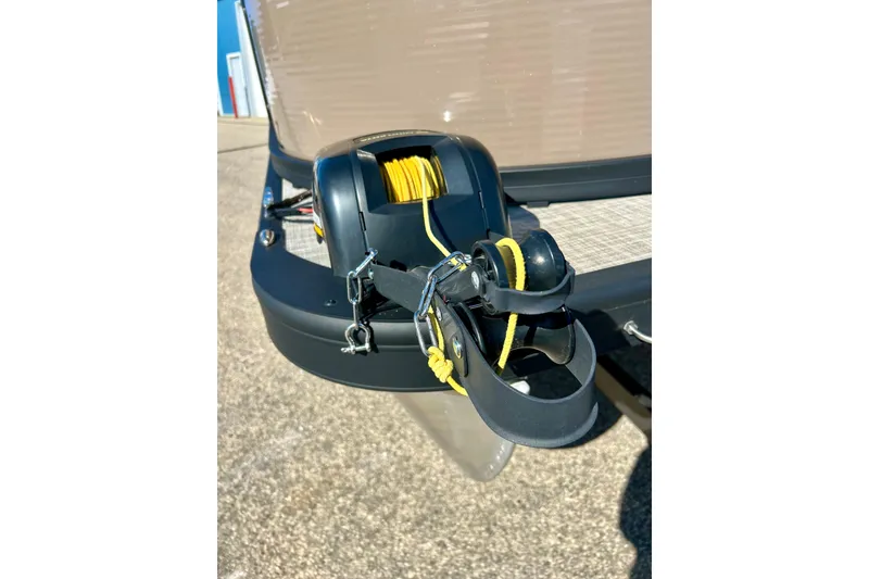 Slide: The Image of 2023 Flagship 200 Lounge Lounger with a secure winch system on the deck. - 8