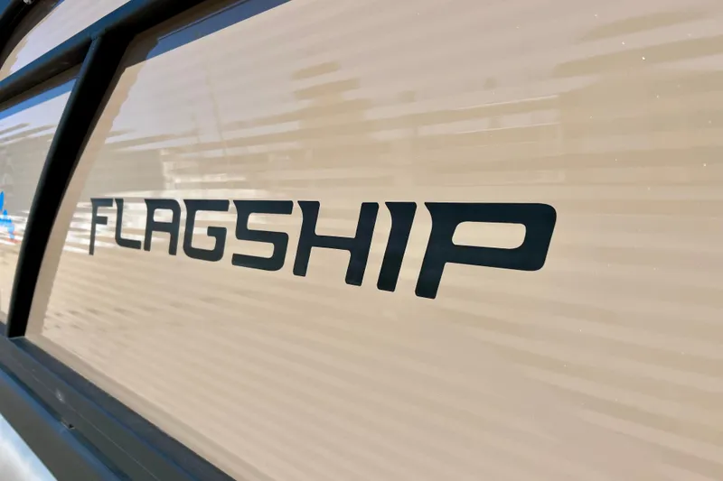 Slide: The Image of Flagship 200 Lounge Lounger 2023 model logo on beige surface. - 9