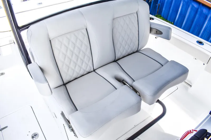 Slide: The Image of Luxurious seating on 2026 Sea Hunt Ultra 285 Coffin Box boat, featuring diamond-stitched upholstery. - 7