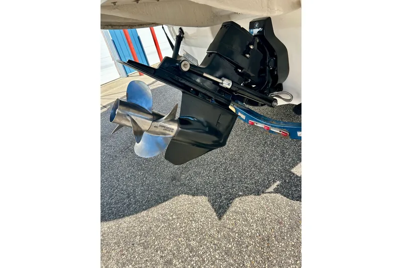 Slide: The Image of Propeller of a 2000 Sea Ray 240 Sundeck boat on a trailer. - 11