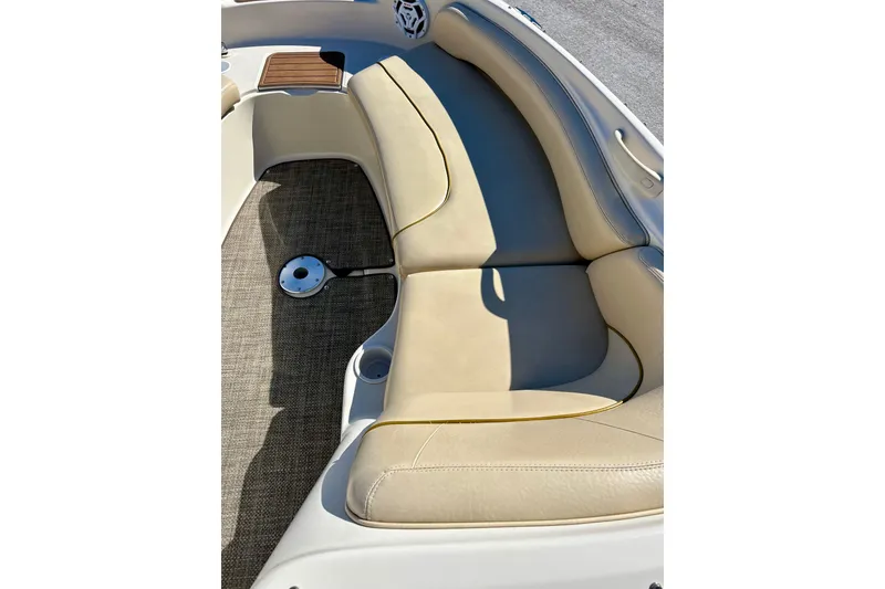 Slide: The Image of 2000 Sea Ray 240 Sundeck helm with steering wheel and instrument panel. - 20