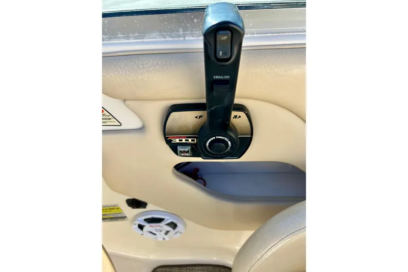 Slide: The Image of Dashboard of a 2000 Sea Ray 240 Sundeck boat with gauges and controls. - 37