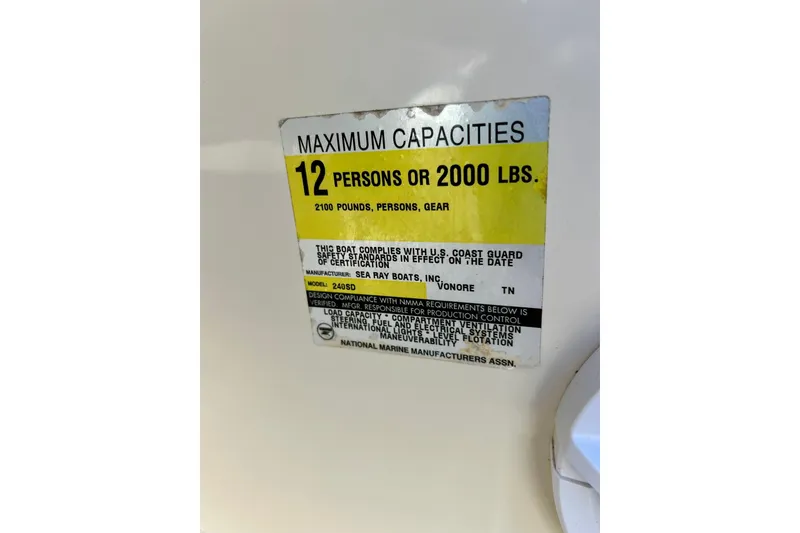 Slide: The Image of Throttle control of a 2000 Sea Ray 240 Sundeck boat, featuring Mercury branding. - 38