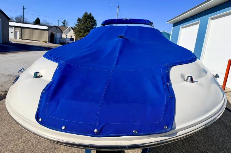 Slide: The Image of Folded ladder on a 2000 Sea Ray 240 Sundeck boat. - 61