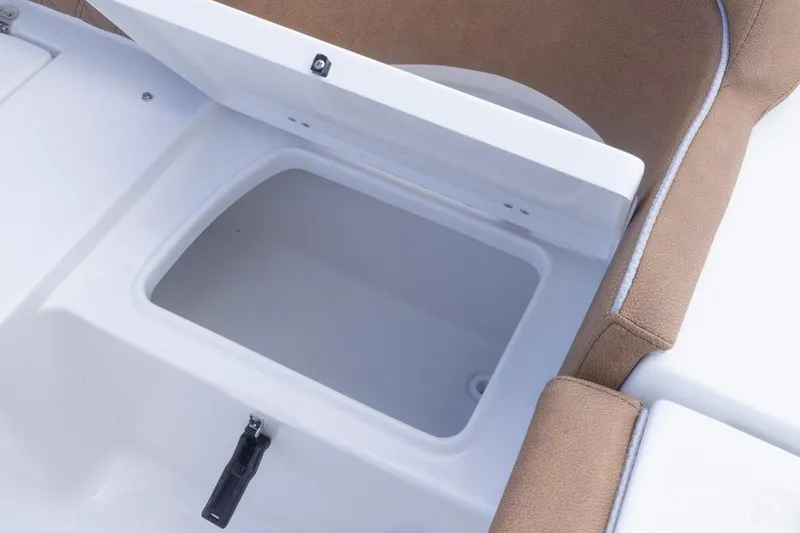 Slide: The Image of Open storage compartment on 2026 Sea Hunt Ultra 275 SE boat. - 21