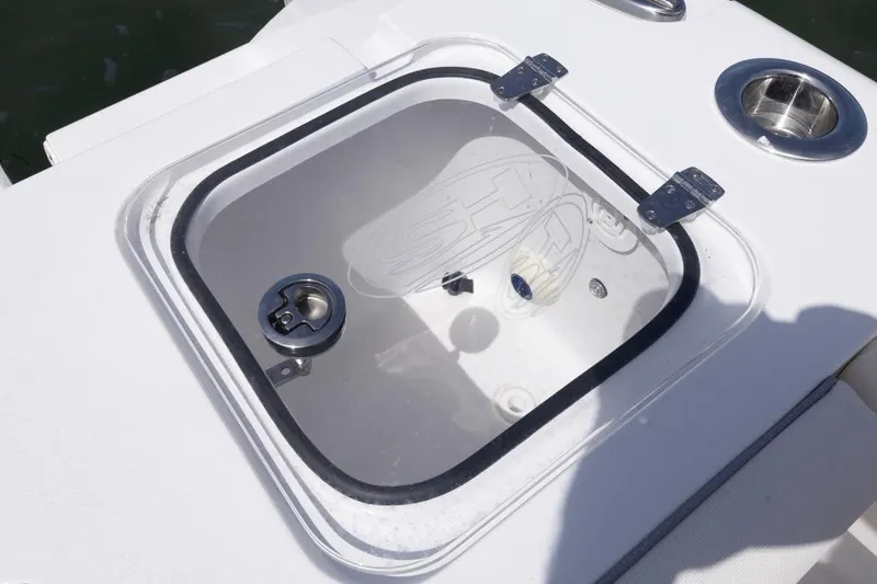 Slide: The Image of Livewell hatch on 2026 Sea Hunt Gamefish 27 Forward Seating boat. - 15